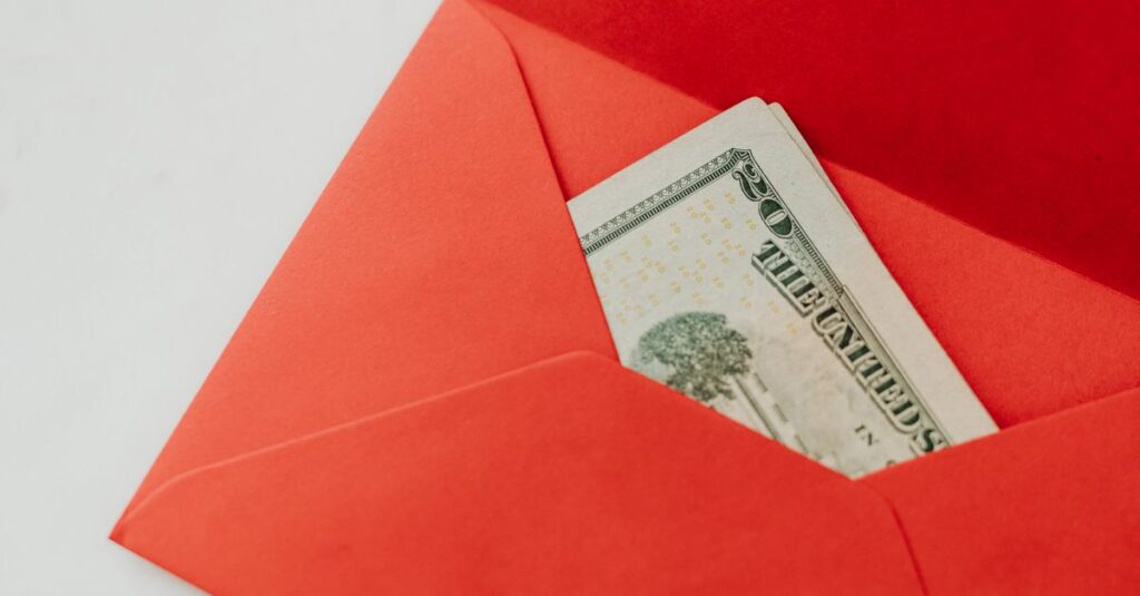 A red envelope containing U.S. dollar bills, symbolizing wealth and gifting.